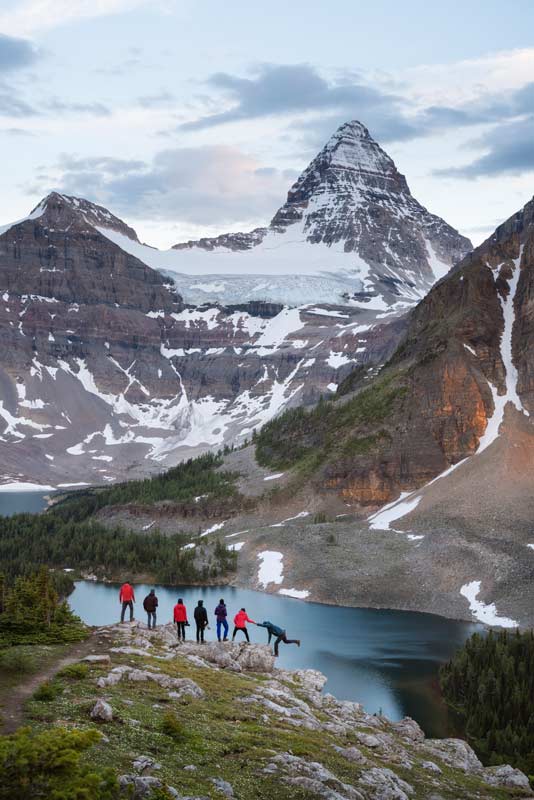 Mt Assiniboine Photography Workshop group posing along the Niblet framed by Sunburst Lake.